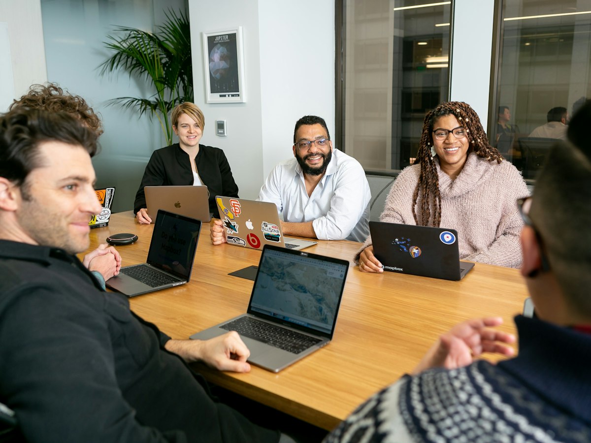 A team meeting around a boardroom table
